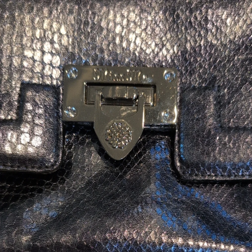Miss Me Shimmering Silver Clutch